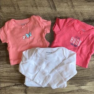 3 Carter’s onesies
